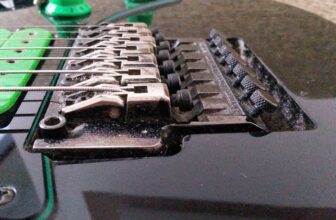 Seven strings and Lo Pro Edge tremolo bridge on an Ibanez Universe guitar